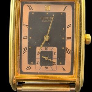 Seiko Gold-Tone Watch with Black and Rose Dial